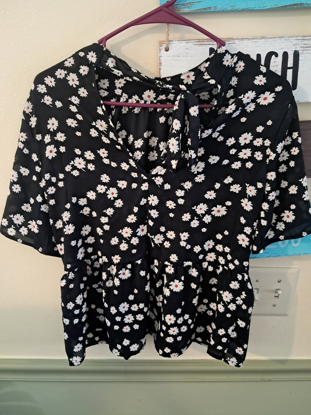 Sienna Sky Black Floral Tie-Neck Peplum Blouse